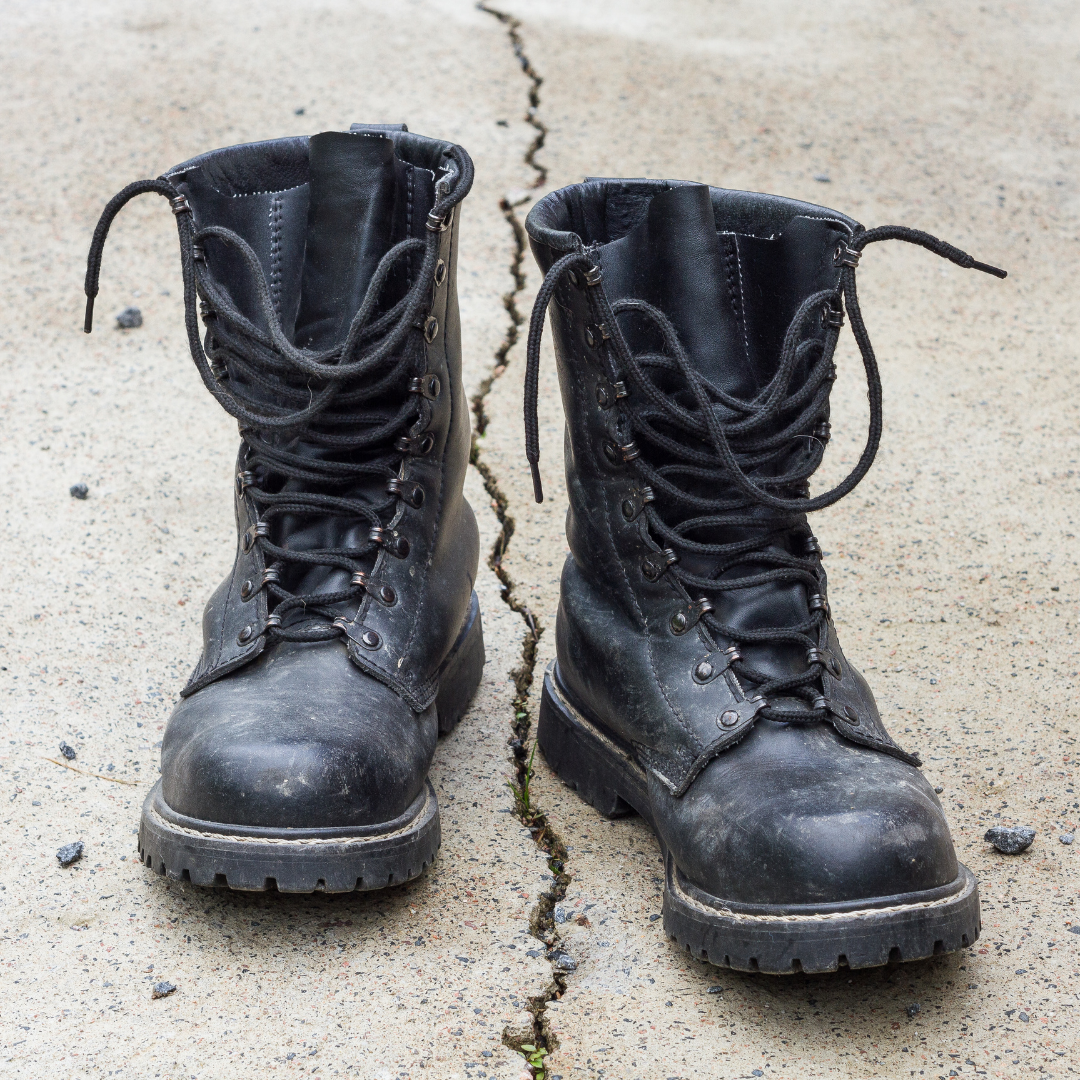 pair of black men's combat boots